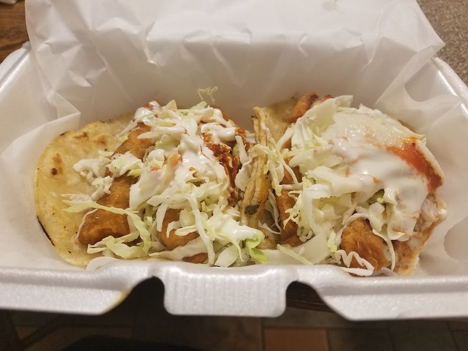 Counter menu board featuring quick bites.
