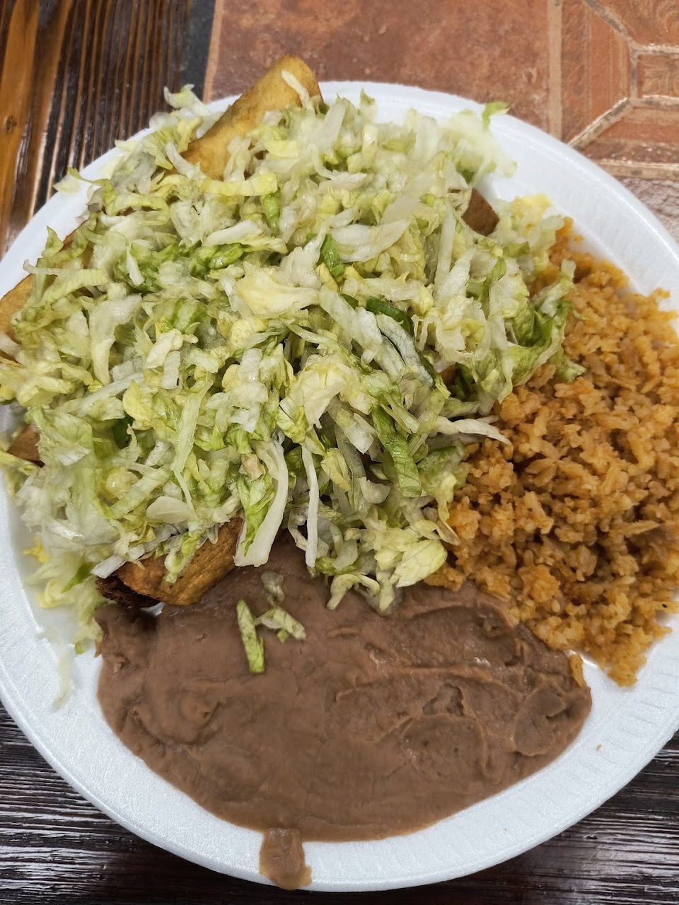 Simple menu listing tortas, sopes, and flan.
